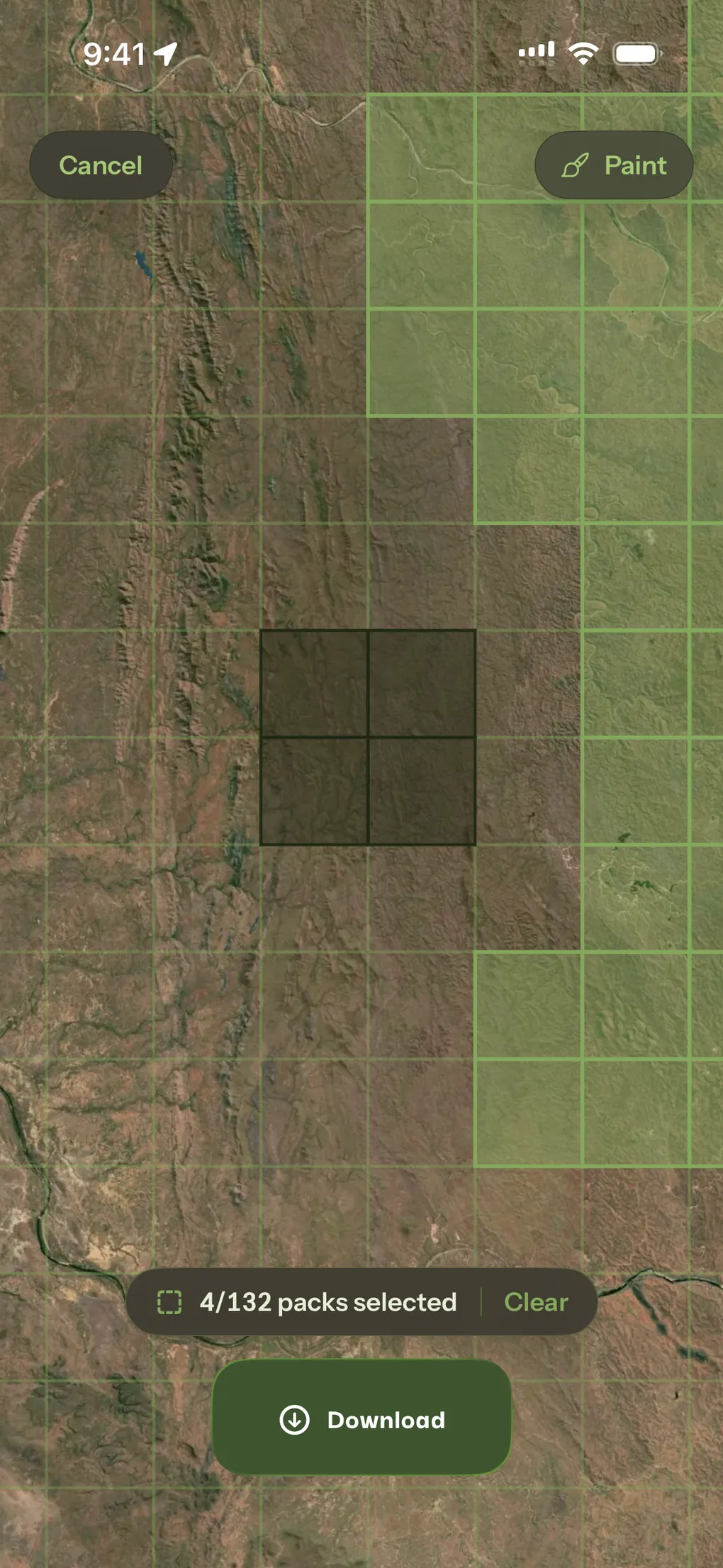 The offline pack picker, map squares painted green over satellite imagery with four of 132 packs selected.