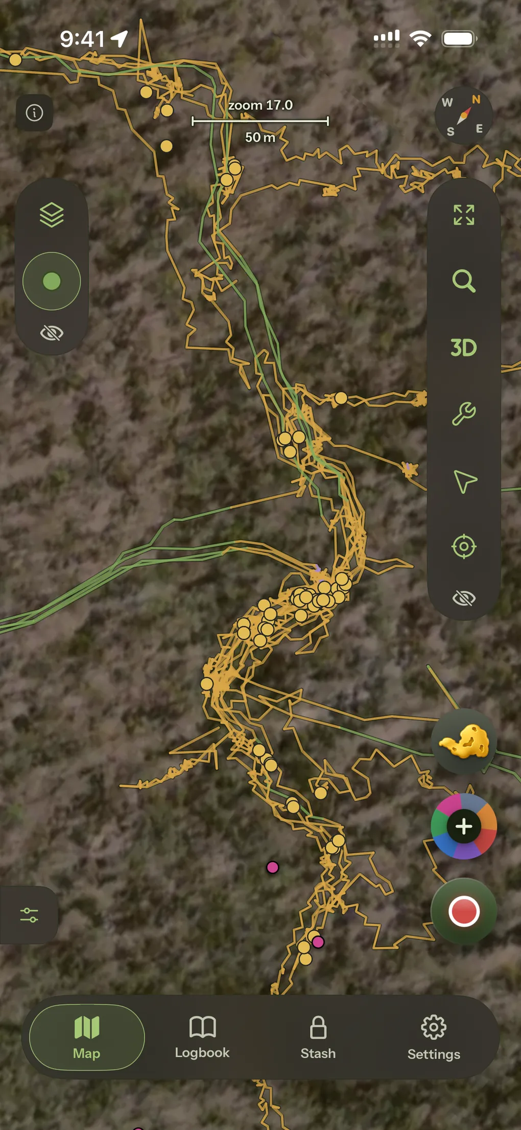 Recorded tracks drawn raw over satellite imagery, a dense gold web threaded with find markers.
