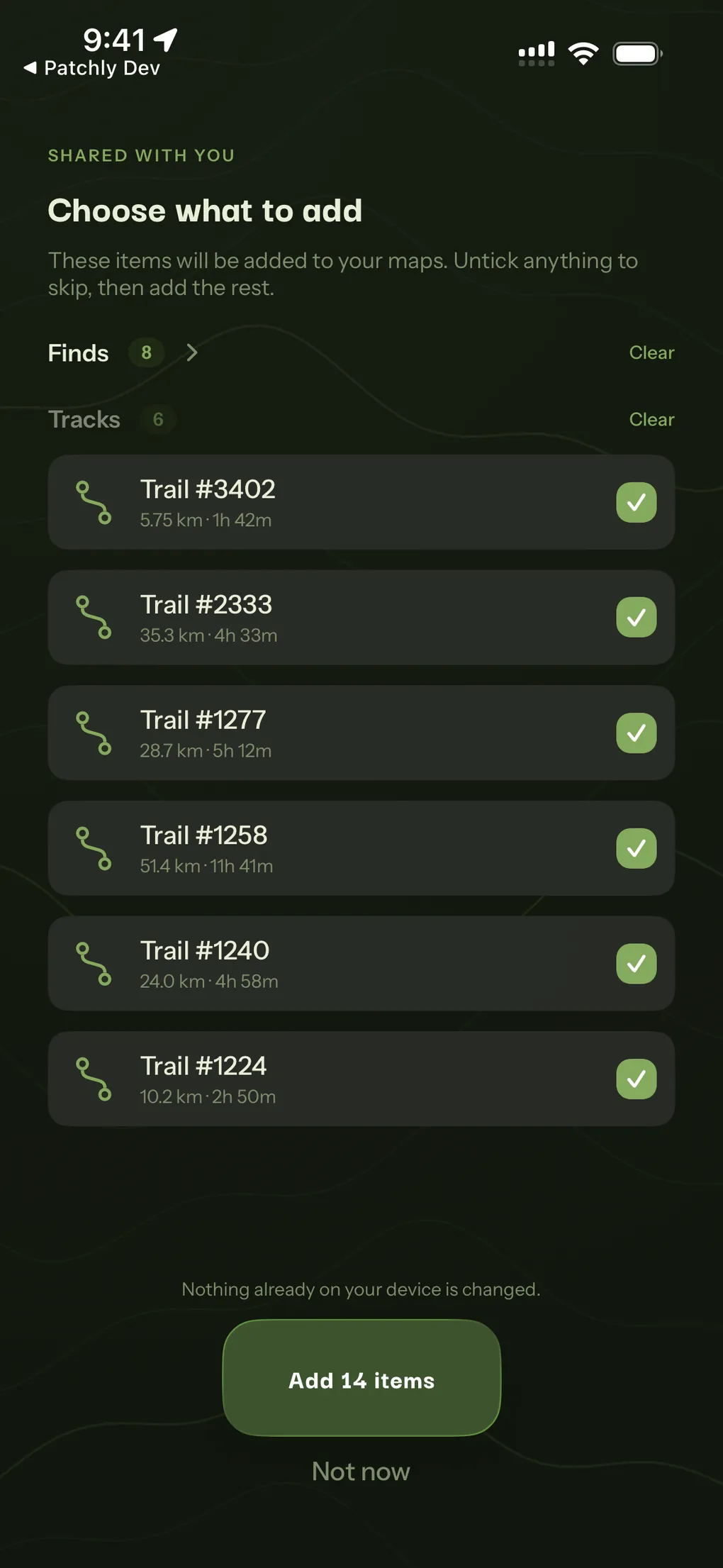 A shared file offering eight finds and six tracks to add, each tickable, leaving what is already on the device untouched.